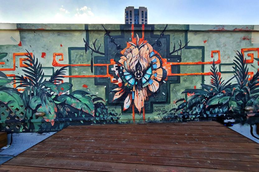 Blossom Up On Earth, Tel Aviv, Rooftop mural, 2022. A project by Maayan Kalo.