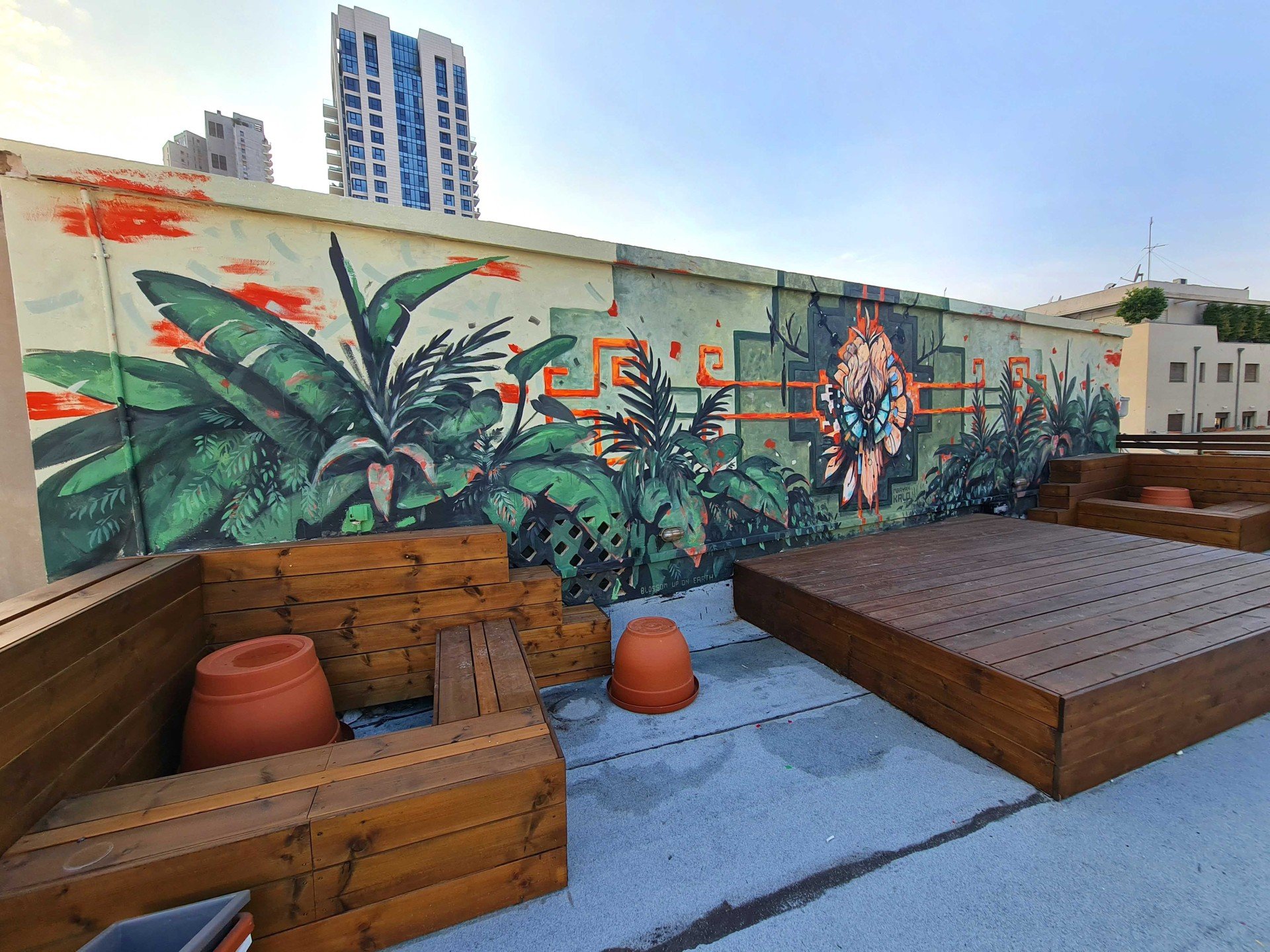 Blossom Up On Earth, Tel Aviv, Rooftop mural, 2022. A project by Maayan Kalo.